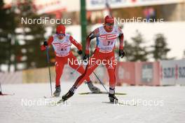 Nordic Combined - FIS Nordic World Ski Championchips nordic combined, team HS134/4x5km, 25.02.07 - Sapporo (JPN): Ronny Heer (SUI), hideaki Nagai (JPN).