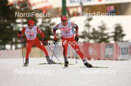 Nordic Combined - FIS Nordic World Ski Championchips nordic combined, team HS134/4x5km, 25.02.07 - Sapporo (JPN): Ronny Heer (SUI), Hideaki Nagai (JPN).