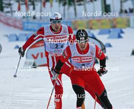 FIS Nordic World Ski Championchips - Nordic Combined Team - Sapporo (JPN) - 25.02.07: Group, left to right Magnus-H. Moan (NOR), Felix Gottwald (AUT)