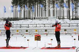 28.11.2007, Kontiolahti, Finland (FIN): Jeremy Teela (USA) and Simon Fourcade (FRA) - IBU world cup biathlon, individual men, training, Kontiolahti (FIN). www.nordicfocus.com. c Manzoni/NordicFocus. Every downloaded picture is fee-liable.