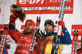 01.12.2007, Kontiolahti, Finland (FIN): Ole Einar Bjoerndalen (NOR) and Vincent Defrasne (FRA)  - IBU world cup biathlon, sprint men, Kontiolahti (FIN). www.nordicfocus.com. c Manzoni/NordicFocus. Every downloaded picture is fee-liable.