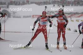 09.12.2007, Hochfilzen (AUT): handover SUI l-r: Ivan Joller (SUI), Claudio Boeckli (SUI)  - IBU World Cup biathlon, relay men - Hochfilzen (AUT). www.nordicfocus.com. c Furtner/NordicFocus. Every downloaded picture is fee-liable.
