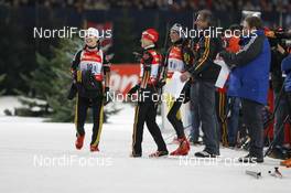 29.12.2007, Gelsenkirchen, Germany (GER): l-r: Kathrin Hitzer (GER), Andrea Henkel (GER), Michela Ponza (ITA), laughing after the shoot out competition - Biathlon World Team Challenge WTC AufSchalke - Gelsenkirchen (GER). www.nordicfocus.com. c Felgenhauer/NordicFocus. Every downloaded picture is fee-liable.