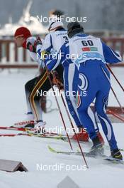 02.12.2007, Kuusamo, Finland (FIN): Roland Clara (ITA) defenitly not crashing into Tobias Angerer (GER)  - FIS world cup cross-country, 15km men, Kuusamo (FIN). www.nordicfocus.com. c Felgenhauer/NordicFocus. Every downloaded picture is fee-liable.
