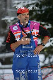 08.12.2007, Davos (SUI): Service technician with radio - FIS World Cup cross-country, 10km women - Davos (SUI). www.nordicfocus.com. c Manzoni/NordicFocus. Every downloaded picture is fee-liable.