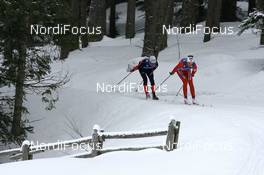 09.12.2007, Davos (SUI): Simen Oestensen (NOR) leads Jean Marc Gaillard (FRA) - FIS World Cup cross-country, relay men - Davos (SUI). www.nordicfocus.com. c Manzoni/NordicFocus. Every downloaded picture is fee-liable.