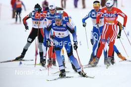 09.12.2007, Davos (SUI): Evgenji Dementiev (RUS) leading the field- FIS World Cup cross-country, relay men - Davos (SUI). www.nordicfocus.com. c Manzoni/NordicFocus. Every downloaded picture is fee-liable.