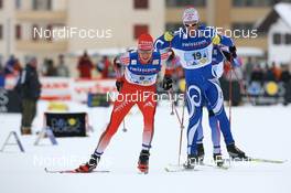 09.12.2007, Davos (SUI): Toni Livers (SUI) leads Renato Pasini (ITA) - FIS World Cup cross-country, relay men - Davos (SUI). www.nordicfocus.com. c Manzoni/NordicFocus. Every downloaded picture is fee-liable.