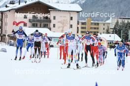09.12.2007, Davos (SUI): Start of mens relay with Mats Larsson (SWE) in front - FIS World Cup cross-country, relay men - Davos (SUI). www.nordicfocus.com. c Manzoni/NordicFocus. Every downloaded picture is fee-liable.