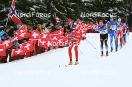 09.12.2007, Davos (SUI): Odd-Bjoern Hjelmeset (NOR) leads Axel Teichmann (GER), Valerio Checchi (ITA) and Jens Arne Svartedal (NOR) - FIS World Cup cross-country, relay men - Davos (SUI). www.nordicfocus.com. c Manzoni/NordicFocus. Every downloaded picture is fee-liable.