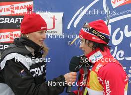 29.12.07, Nove Mesto, Czech Republic (CZE): l-r Sandra Spitz (GER), Tour de Ski Chief of Press, Marit Bjoergen (NOR), feature - FIS world cup cross-country, tour de ski, 10km women, Nove Mesto (CZE). www.nordicfocus.com. c Hemmersbach/NordicFocus. Every downloaded picture is fee-liable.