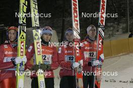 30.11.2007, Kuusamo, Finland (FIN): winner NOR l-r: Roar Ljoekelsoey (NOR), Bjoern Einar Romoeren (NOR), Tom Hilde (NOR), Anders Bardal (NOR) - FIS world cup ski jumping, teamevent, Kuusamo (FIN). www.nordicfocus.com. c Furtner/NordicFocus. Every downloaded picture is fee-liable.