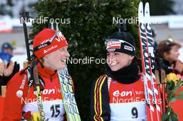 13.01.2008, Ruhpolding, Germany (GER): Tora Berger (NOR) and Andrea Henkel (GER) - IBU world cup biathlon, pursuit women, Ruhpolding (GER). www.nordicfocus.com. c Manzoni/NordicFocus. Every downloaded picture is fee-liable.