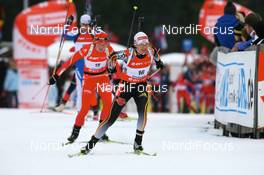 13.01.2008, Ruhpolding, Germany (GER): Simone Denkinger (GER) and Tora Berger (NOR) - IBU world cup biathlon, pursuit women, Ruhpolding (GER). www.nordicfocus.com. c Manzoni/NordicFocus. Every downloaded picture is fee-liable.