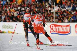 19.01.2008, Antholz, Italy (ITA): Simon Eder (AUT) and Alexander Wolf (GER) - IBU World Cup biathlon, pursuit men - Antholz (ITA). www.nordicfocus.com. c Manzoni/NordicFocus. Every downloaded picture is fee-liable.