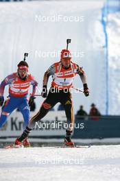 19.01.2008, Antholz, Italy (ITA): Michael Greis (GER) and Nikolay Kruglov (RUS) - IBU World Cup biathlon, pursuit men - Antholz (ITA). www.nordicfocus.com. c Manzoni/NordicFocus. Every downloaded picture is fee-liable.