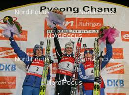 01.03.2008, Pyeong Chang, Korea (KOR): Podium, l-r: Michaela Ponza (ITA), Sandrine Bailly (FRA), Albina Akhatova (RUS) - IBU World Cup biathlon, pursuit women - Pyeong Chang (KOR). www.nordicfocus.com. c Hemmersbach/NordicFocus. Every downloaded picture is fee-liable.