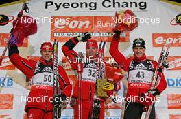 27.02.2008, Pyeong Chang, Korea (KOR): podium, l-r: Halvard Hanevold (NOR), Emil Hegle Svendsen (NOR), Friedrich Pinter (AUT)  - IBU World Cup biathlon, sprint men - Pyeong Chang (KOR). www.nordicfocus.com. c Hemmersbach/NordicFocus. Every downloaded picture is fee-liable.
