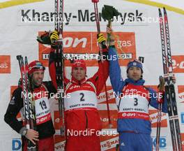 08.03.2008, Khanty Mansiysk, Russia (RUS): podium, l-r: Tomasz Sikora (POL), Emil Hegle Svendsen (NOR), Andrei Makoveev (RUS) - IBU World Cup biathlon, pursuit men - Khanty Mansiysk (RUS). www.nordicfocus.com. c Hemmersbach/NordicFocus. Every downloaded picture is fee-liable.
