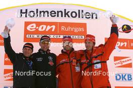 16.03.2008, Holmenkollen, Norway (NOR): winner nations cup: (women) Gerald Hoenig (GER) and Uwe Muessiggang (GER), headcoach women Germany, men Alf Koksvik (NOR), sports director Biathlon Norway and Kjell Ove Oftedal (NOR), headcoach men Team Norway - IBU World Cup biathlon, mass men, Holmenkollen (NOR). www.nordicfocus.com. c Manzoni/NordicFocus. Every downloaded picture is fee-liable.