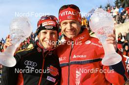 16.03.2008, Holmenkollen, Norway (NOR): l-r: Magdalena Neuner (GER), Ole Einar Bjoerndalen (NOR) - IBU World Cup biathlon, mass men, Holmenkollen (NOR). www.nordicfocus.com. c Manzoni/NordicFocus. Every downloaded picture is fee-liable.