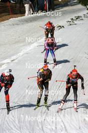 16.03.2008, Holmenkollen, Norway (NOR): l-r: Sandrine Bailly (FRA), Magdalena Neuner (GER), Andrea Henkel (GER) lead Ekaterina Iourieva (RUS) Kati Wilhelm (GER)  - IBU World Cup biathlon, mass women, Holmenkollen (NOR). www.nordicfocus.com. c Manzoni/NordicFocus. Every downloaded picture is fee-liable.