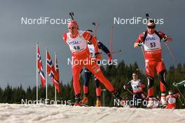 15.03.2008, Holmenkollen, Norway (NOR): l-r: Lars Berger (NOR), Christoph Sumann (AUT) - IBU World Cup biathlon, pursuit men, Holmenkollen (NOR). www.nordicfocus.com. c Manzoni/NordicFocus. Every downloaded picture is fee-liable.