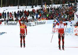 17.02.2008, Oestersund, Sweden (SWE): l-r: Ole Einar Bjoerndalen (NOR), Emil Hegle Svendsen (NOR) - IBU World Championchip of Biathlon, mass men - Oestersund (SWE). www.nordicfocus.com. c Manzoni/NordicFocus. Every downloaded picture is fee-liable.