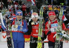 16.02.2008, Oestersund, Sweden (SWE): medal, l-r Ekaterina Iourieva (RUS), Magdalena Neuner (GER), Tora Berger (NOR)  - IBU World Championchip of Biathlon, medal shooting - Oestersund (SWE). www.nordicfocus.com. c Hemmersbach/NordicFocus. Every downloaded picture is fee-liable.