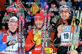 10.02.2008, Oestersund, Sweden (SWE): l-r: Maxim Tchoudov (RUS), Ole Einar Bjoerndalen (NOR), Alexander Wolf (GER) - IBU World Championchip of Biathlon, medal shooting - Oestersund (SWE). www.nordicfocus.com. c Manzoni/NordicFocus. Every downloaded picture is fee-liable.