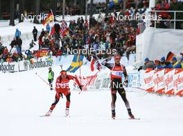 16.02.2008, Oestersund, Sweden (SWE): l-r: Christoph Sumann (AUT) and Michael Greis (GER) - IBU World Championchip of Biathlon, relay men - Oestersund (SWE). www.nordicfocus.com. c Manzoni/NordicFocus. Every downloaded picture is fee-liable.
