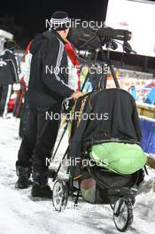 04.12.2008, Oestersund, Sweden (SWE): Coach with a pram at the shooting range - IBU world cup biathlon, individual women, Oestersund (SWE). www.nordicfocus.com. © Manzoni/NordicFocus. Every downloaded picture is fee-liable.
