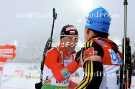 07.12.2008, Oestersund, Sweden (SWE): Tomasz Sikora (POL), Fischer, Rottefella, Alpina, Swix  and Michael Greis (GER), Madshus, Rottefella, Exel, adidas - IBU world cup biathlon, pursuit men, Oestersund (SWE). www.nordicfocus.com. © Manzoni/NordicFocus. Every downloaded picture is fee-liable.