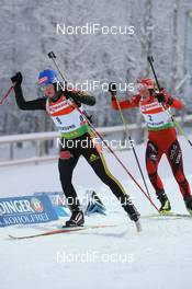 07.12.2008, Oestersund, Sweden (SWE): Martina Beck (GER), Rossignol, Rottefella, Madshus, Swix, adidas, Toko and Tora Berger (NOR), Fischer, Rottefella, Odlo - IBU world cup biathlon, pursuit women, Oestersund (SWE). www.nordicfocus.com. © Manzoni/NordicFocus. Every downloaded picture is fee-liable.
