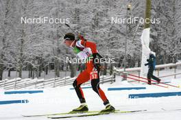 06.12.2008, Oestersund, Sweden (SWE): Dominik Landertinger (AUT), Fischer, Rottefella, Leki - IBU world cup biathlon, sprint men, Oestersund (SWE). www.nordicfocus.com. © Manzoni/NordicFocus. Every downloaded picture is fee-liable.