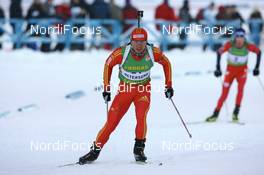 06.12.2008, Oestersund, Sweden (SWE): Chengye Zhang (CHN), Fischer, Salomon, Swix, adidas - IBU world cup biathlon, sprint men, Oestersund (SWE). www.nordicfocus.com. © Manzoni/NordicFocus. Every downloaded picture is fee-liable.