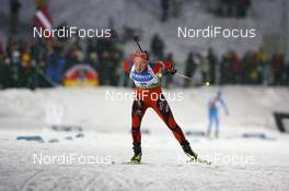 06.12.2008, Oestersund, Sweden (SWE): Tora Berger (NOR), Fischer, Rottefella, Odlo - IBU world cup biathlon, sprint women, Oestersund (SWE). www.nordicfocus.com. © Manzoni/NordicFocus. Every downloaded picture is fee-liable.