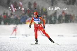 06.12.2008, Oestersund, Sweden (SWE): Chaoqing Song (CHN), Fischer, Salomon, Swix, adidas - IBU world cup biathlon, sprint women, Oestersund (SWE). www.nordicfocus.com. © Manzoni/NordicFocus. Every downloaded picture is fee-liable.