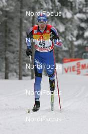 02.01.08, Nove Mesto, Czech Republic (CZE): Evgenji Dementiev (RUS)  - FIS world cup cross-country, tour de ski, 15 km men, Nove Mesto (CZE). www.nordicfocus.com. c Hemmersbach/NordicFocus. Every downloaded picture is fee-liable.
