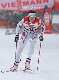 04.01.08, Asiago, Italy (ITA): David Nighbor (CAN)  - FIS world cup cross-country, tour de ski, individual sprint, Asiago (ITA). www.nordicfocus.com. c Hemmersbach/NordicFocus. Every downloaded picture is fee-liable.