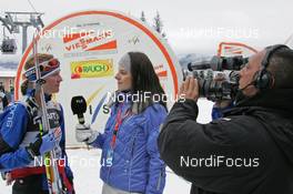 06.01.08, Val di Fiemme, Italy (ITA): feature, Virpi Kuitunen (FIN), interview YLE - FIS world cup cross-country, tour de ski, final climb women, Val di Fiemme (ITA). www.nordicfocus.com. c Hemmersbach/NordicFocus. Every downloaded picture is fee-liable.