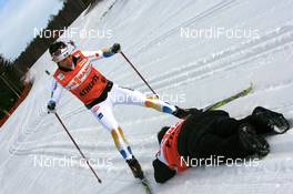 22.02.2008, Falun, Sweden (SWE): Charlotte Kalla (SWE) skis over a photographer - FIS world cup cross-country, training and venue - Falun (SWE). www.nordicfocus.com. c Manzoni/NordicFocus. Every downloaded picture is fee-liable.