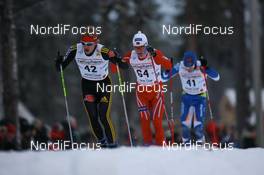 22.11.2008, Gaellivare, $weden (SWE): Tom Reichelt (GER), Madshus, Rottefella, One Way, adidas, Martin Johnsrud Sundby (NOR), Fischer, Rottefella, Alpina, Swix - FIS world cup cross-country, 15km men, Gaellivare (SWE). www.nordicfocus.com. © Manzoni/NordicFocus. Every downloaded picture is fee-liable.