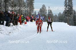 23.11.2008, Gaellivare, $weden (SWE): Martin Johnsrud Sundby (NOR), Fischer, Rottefella, Alpina, Swix leads the field - FIS world cup cross-country, relay men, Gaellivare (SWE). www.nordicfocus.com. © Manzoni/NordicFocus. Every downloaded picture is fee-liable.