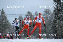 23.11.2008, Gaellivare, $weden (SWE): Dario Cologna (SUI), Fischer, Rottefella, Alpina, Swix, adidas, Tord Asle Gjerdalen (NOR), Atomic, Salomon, One Way, Swix - FIS world cup cross-country, relay men, Gaellivare (SWE). www.nordicfocus.com. © Manzoni/NordicFocus. Every downloaded picture is fee-liable.