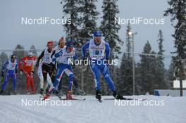 23.11.2008, Gaellivare, $weden (SWE): Evgenji Dementiev (RUS), Madshus, Salomon, Swix, adidas, Teemu Kattilakoski (FIN), Peltonen, Rottefella, Alpina - FIS world cup cross-country, relay men, Gaellivare (SWE). www.nordicfocus.com. © Manzoni/NordicFocus. Every downloaded picture is fee-liable.