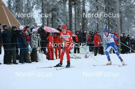 23.11.2008, Gaellivare, $weden (SWE): Kristin Stoermer Steira (NOR), Madshus, Rottefella, One Way, Swix, Aino Kaisa Saarinen (FIN), Rossignol, Rottefella, One Way - FIS world cup cross-country, relay women, Gaellivare (SWE). www.nordicfocus.com. © Manzoni/NordicFocus. Every downloaded picture is fee-liable.