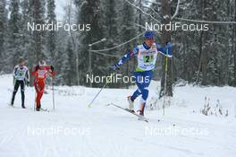 23.11.2008, Gaellivare, $weden (SWE): Virpi Kuitunen (FIN), Rossignol, Rottefella, One Way lead Therese Johaug (NOR), Fischer, Salomon, Swix - FIS world cup cross-country, relay women, Gaellivare (SWE). www.nordicfocus.com. © Manzoni/NordicFocus. Every downloaded picture is fee-liable.