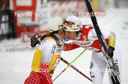 30.11.2008, Kuusamo, Finland (FIN): Petra Majdic (SLO), Fischer, Rottefella, Alpina, One Way and Charlotte Kalla (SWE), Fischer, Salomon, Swix, Craft slightly disappointed in the finish area - FIS world cup cross-country, 10km women, Kuusamo (FIN). www.nordicfocus.com. © Felgenhauer/NordicFocus. Every downloaded picture is fee-liable.