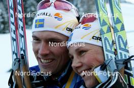 13.12.2008, Davos, Switzerland (SUI): Johan Olsson (SWE), Madshus, Salomon, One Way, Craft and Anna Dahlberg (SWE), Salomon - FIS world cup cross-country, 15km men, Davos (SUI). www.nordicfocus.com. © Manzoni/NordicFocus. Every downloaded picture is fee-liable.